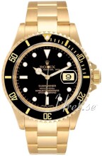 Rolex Submariner Date Black Dial Yellow Gold Fliplock Bracelet